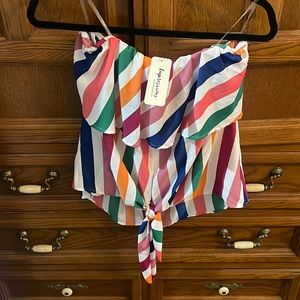 From Impressions Boutique. Never worn with tags